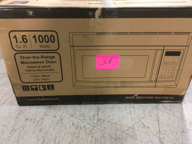 lot 34 image: Magic Chef 1.6 cu. ft. Over the Range Microwave in Black open box in like new condition