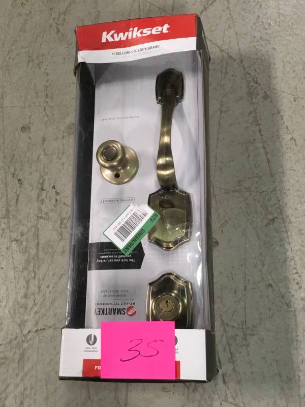 lot 35 image: Kwikset Belleview Antique Brass Single Cylinder Door Handleset with Tylo Knob Featuring SmartKey Security open box in like new condition