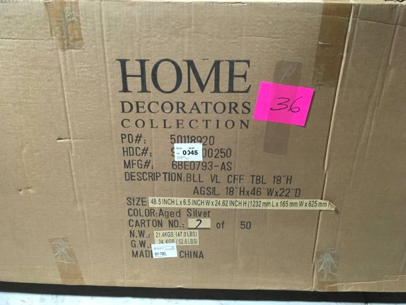 lot 36 image: Home Decorators Collection Bella Aged Silver Oval Glass Coffee Table open box in like new condition