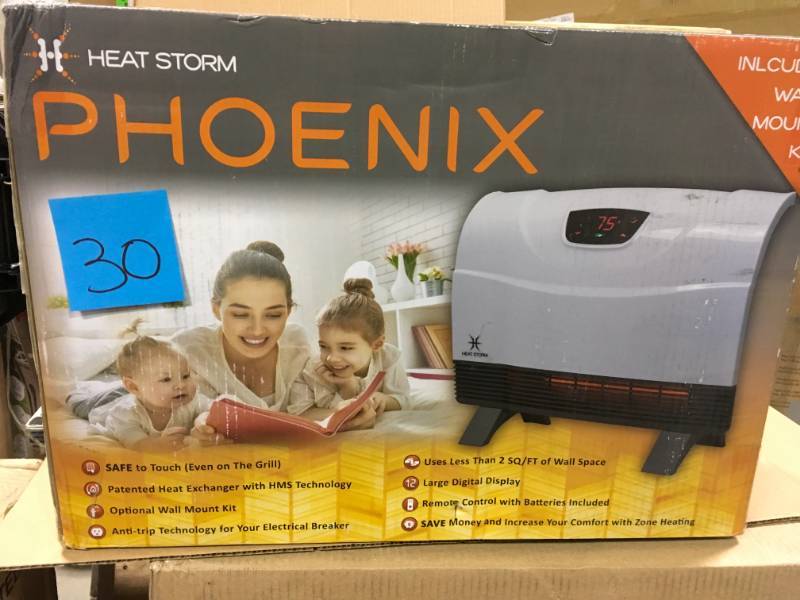 lot 30 image: Heat Storm Phoenix Floor to Wall Unit 1,500-Watt Infrared Quartz Portable Heater with Built-In Thermostat and Over Heat Sensor open box in like new condition