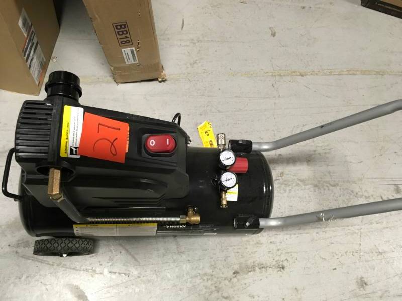 lot 27 image: Husky 8 Gal. Portable Oil Free Electric Air Compressor in very good condition