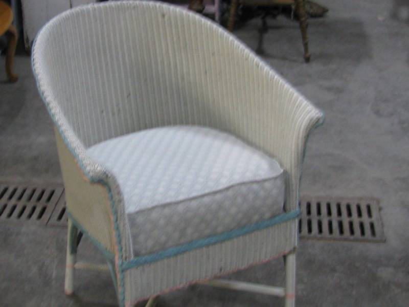 lot 10 image: Wicker Chair