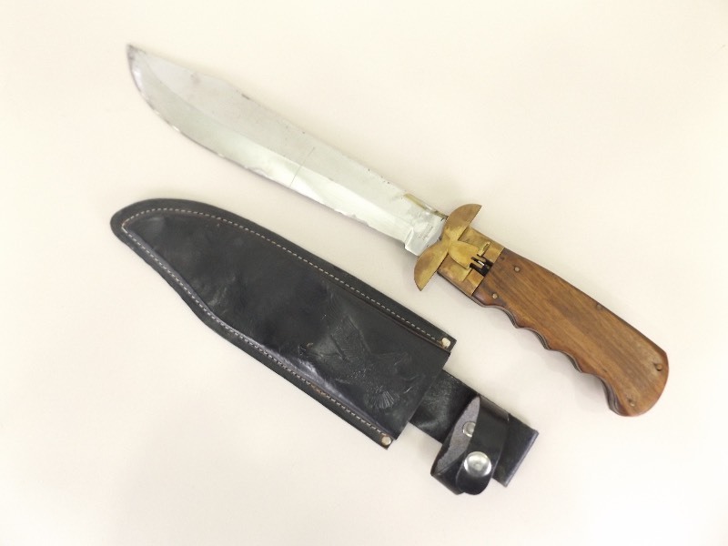 lot 13 image: LARGE Wood Handled Folding Machete in Leather Sheath