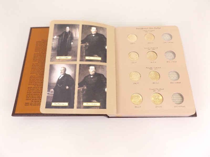 lot 27 image: Dansco Coin Book of 8 Gem Mint BU U.S. Presidential Dollars
