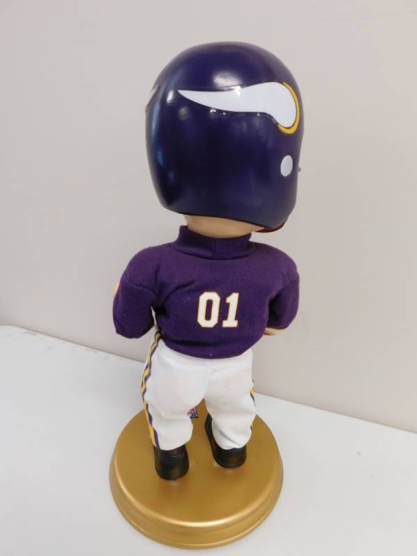 lot 92 image: NFL Dancing Vikings Player