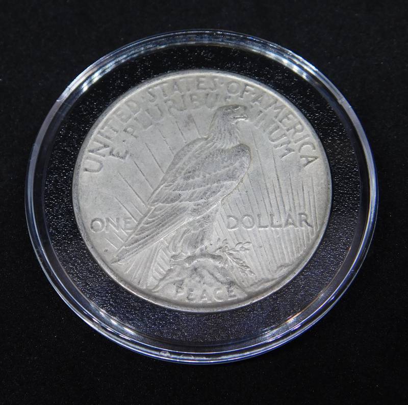 lot 23 image: 1922 D Peace Silver Dollar Coin in Air-Tite Holder
