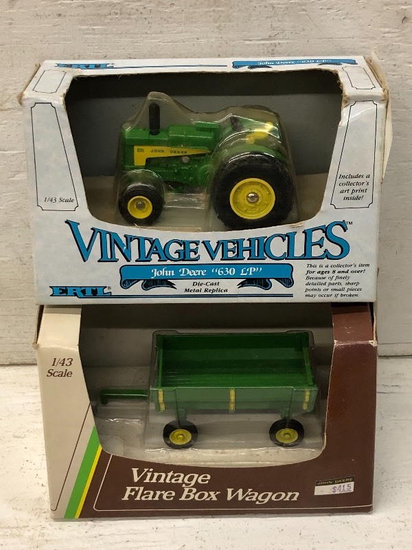 lot 31 image: (2) Ertl 143-Scale Die-Cast Replicas