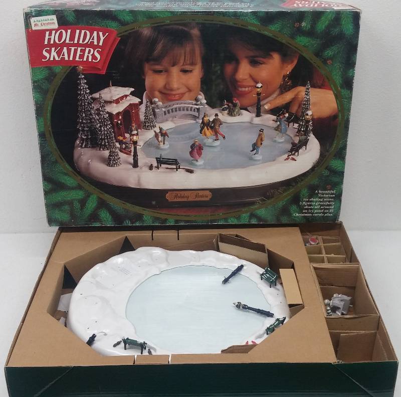 lot 61 image: Mr. Holiday Christmas Skaters