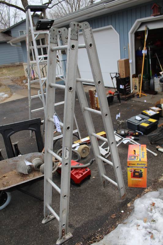lot 310 image: Louisville 6ft. Aluminum Extension Ladder