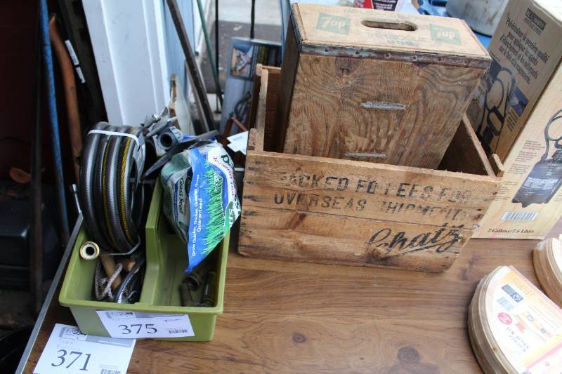 lot 375 image: Grass Seed, Garden Hose, Tool Caddy, Wood Crates
