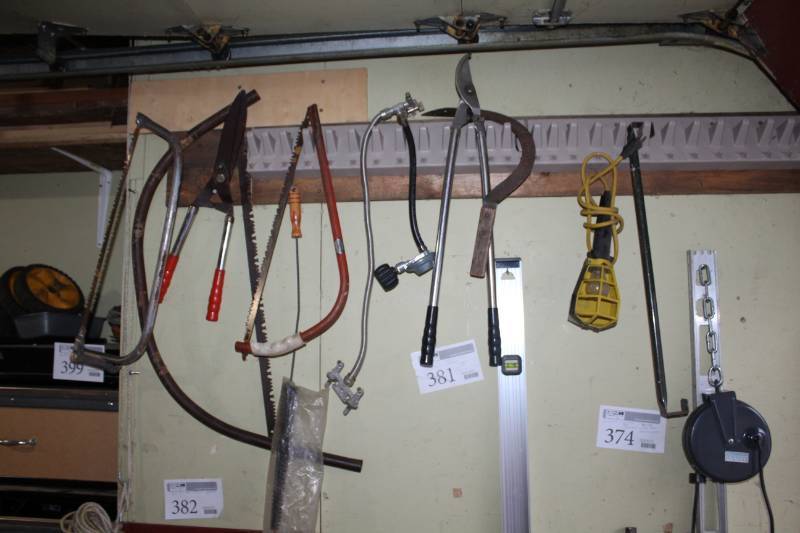 lot 381 image: Hand Saws, Levels, Sickle, Shears, Hanging Lights
