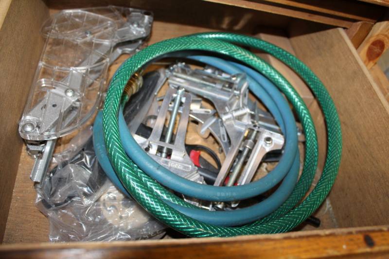 lot 443 image: Hoses, Table Saw Guides, Clamps, And More
