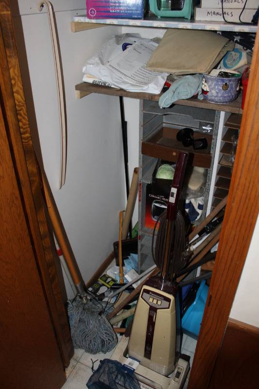 lot 1034 image: Cleaning Closet Contents