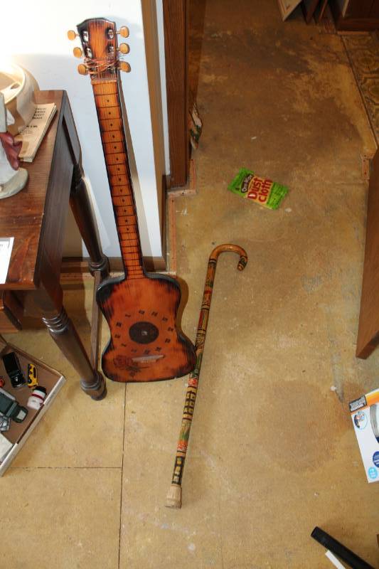 lot 1089 image: Walking Cane and Guitar Shaped Clock