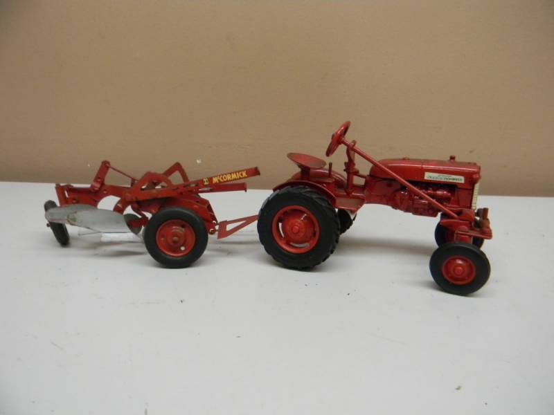 lot 61 image: ERTL McCORMICK FARMALL CUB COLLECTION - FARM EQUIPMENT - 116 SCALE - SEE PICTURES