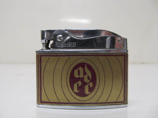 lot 108 image: Vintage Advertising Lighter