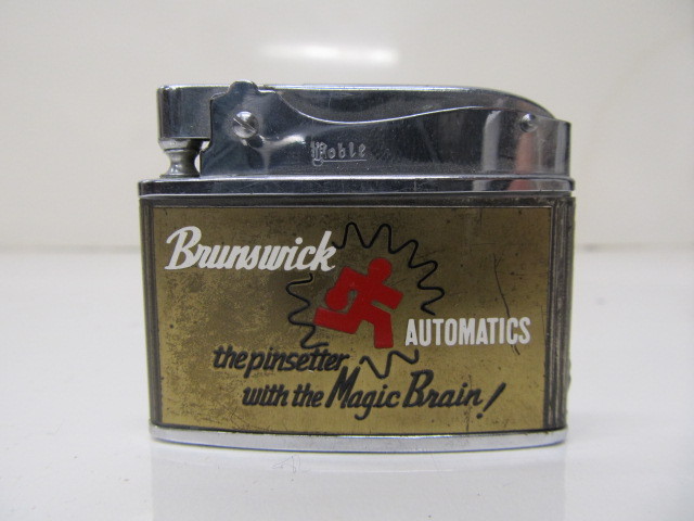 lot 111 image: Brunswick Automatics Bowling Lighter