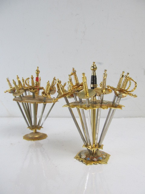 lot 47 image: 2 Vintage TOLEDO Metal Sword Cocktail Bar Pick Sets
