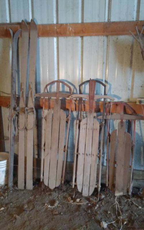 lot 29 image: 2-Pair Vintage Wood Skis, 3-Old Wood Steel Runner Sleds & Hand Crafted Fire Fan