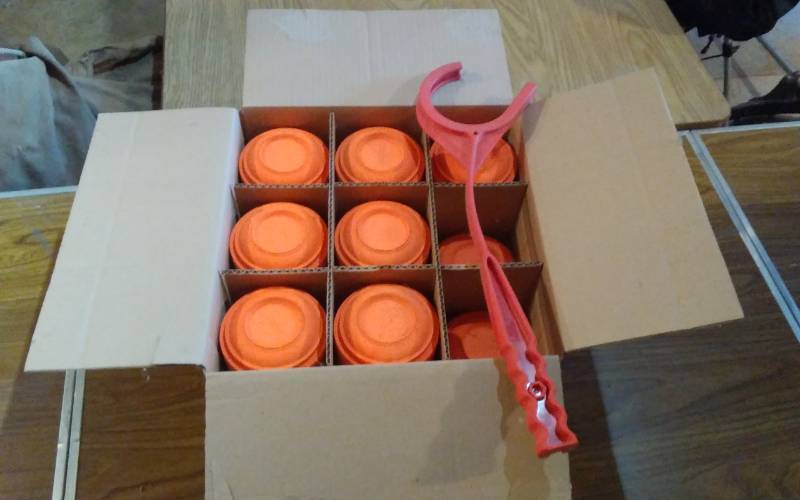 lot 106 image: Almost Full Case Of Clay Pigeons & Thrower