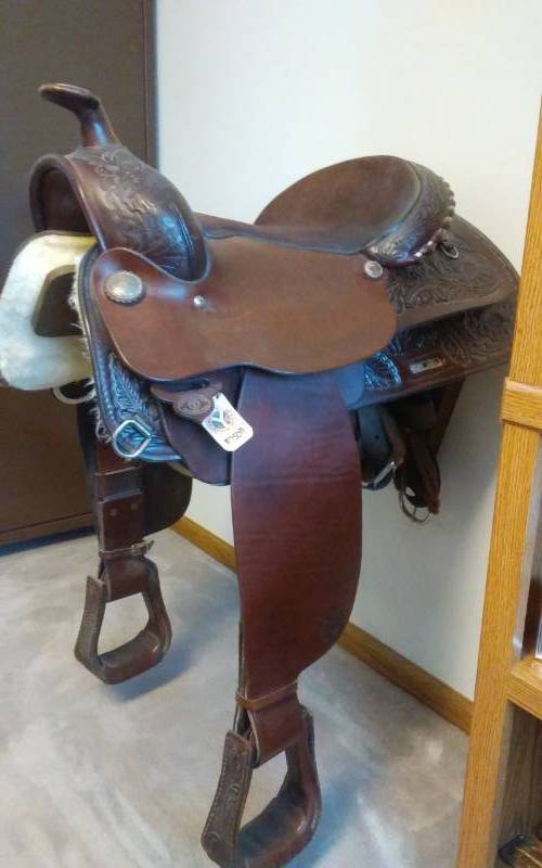 lot 169 image: Genuine Leather CIRCLE Y Saddle With Wall Mount Saddle Rack