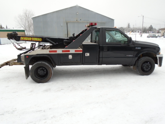 lot 1 image: 2000 Ford F-450 Tow Truck