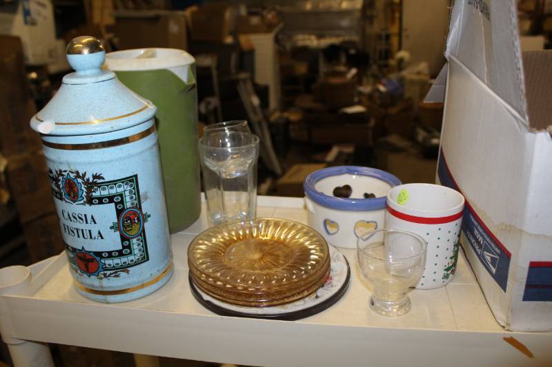 lot 86 image: Cups, Glasses, Glass Plates, Serving Bowls, Cassia Fistula Jar with Lid, Plastic Water Pitcher