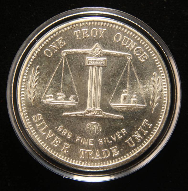 1 TROY OZ. .999 FINE SILVER EAGLE-FLAG TRADE UNIT IN AIRTITE