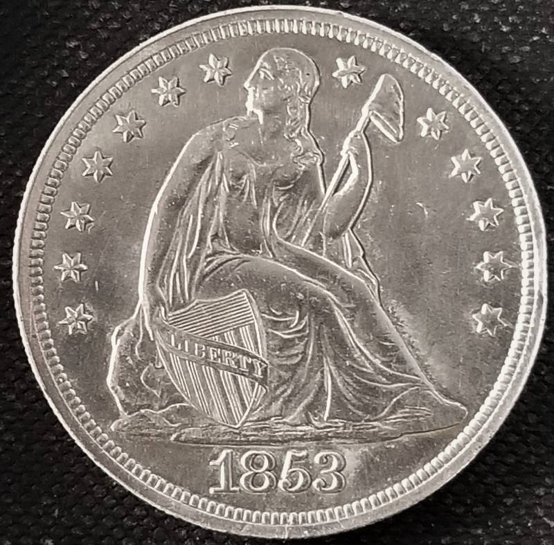 1853 US SEATED LIBERTY DOLLAR IN HIGH GRADE
