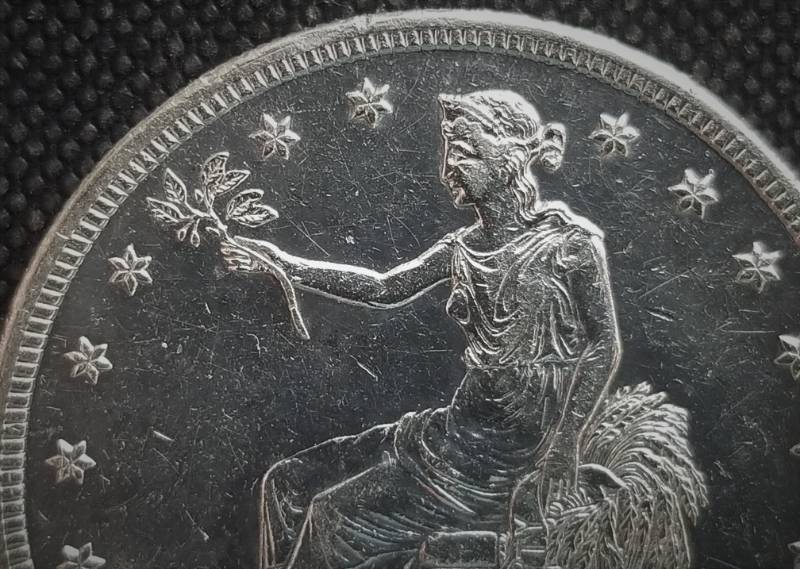 1877-S US TRADE DOLLAR IN HIGHER GRADE