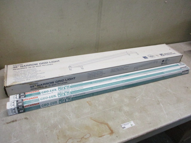 lot 21 image: American Florescent 48 Light Fixture with two Sylvania 48 Gro Lux plant light bulbs  Great for starting seedlings or for winter grow beds.