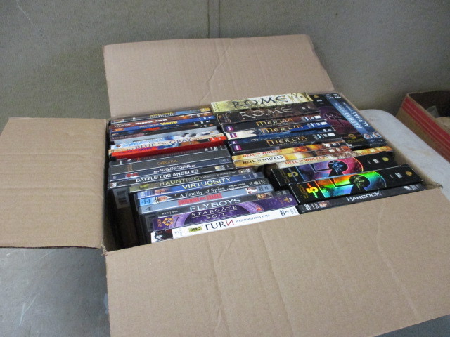 lot 22 image: Box of DVD Series and Movies  Turn, Hell On Wheels, Rome, Alphas, Babylon 5 Merlin and many other movies.
