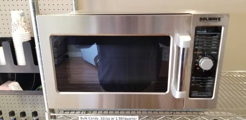 lot 23 image: Solwave 1000W Commercial Stackable Microwave  Brand new used less than 1 month for event. Great condition stainless outer housing and commercially compliant in Minnesota. Can be stacked for counter spacing with other similar units.