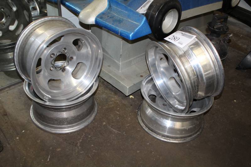 lot 280 image: Chevy Uni Lug 5-Lug Slotted Mag Wheels