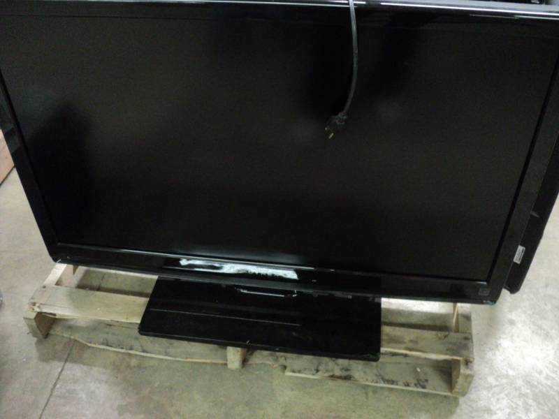 lot 107 image: Dynex 42 TV powers on...