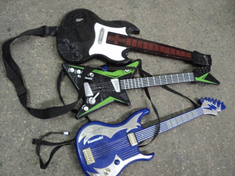 lot 49 image: Guitars for Guitar Hero...