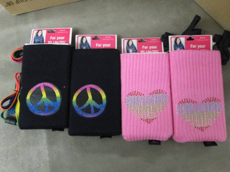 lot 70 image: 4 Boxes of 4 Carrying Pouches for D...