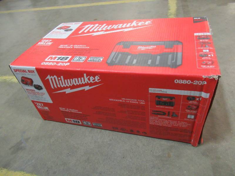 lot 68 image: Milwaukee M18 18-Volt Lithium-Ion Cordless 2 Gal. WetDry Vacuum with (1) 5.0Ah Battery and Charger - NEW in BOX