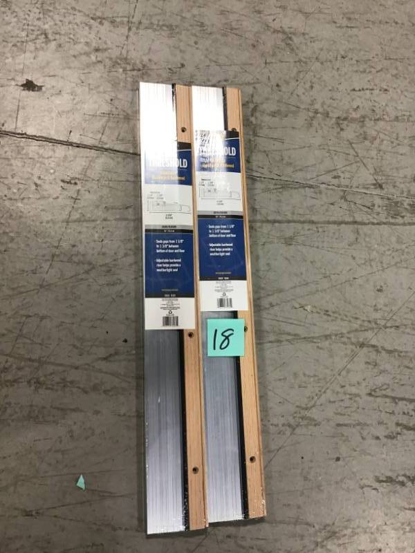 M-D Building Products 4-916 in. x 36 in. Satin Aluminum and Oak Adjustable Threshold QTY 2 not used