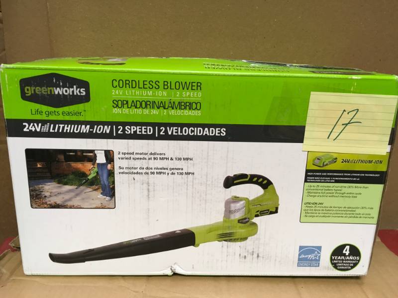 lot 17 image: Greenworks G-24 130 MPH 135 CFM 24-Volt Cordless Handheld Leaf Blower - Battery and Charger Included  open box in like new condition
