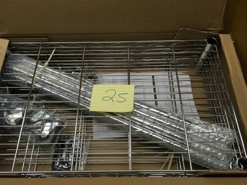 lot 25 image: Mind Reader 49 in. H x 23 in. W x 13 in. L 4-Tier Metal Storage Rack Shelving Unit with Wheels in Silver  open box in like new condition