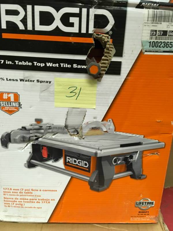 lot 31 image: RIDGID 120-Volt 7 in. Table Top Wet Tile Saw USED