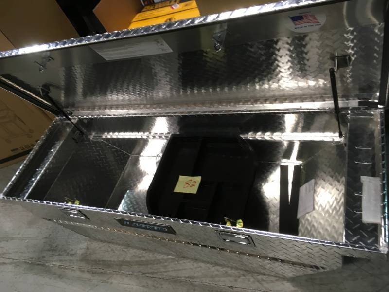lot 82 image: Lund 63 in. Mid Size Single Lid Aluminum Beveled Low Profile Cross Bed Truck Tool Box not used