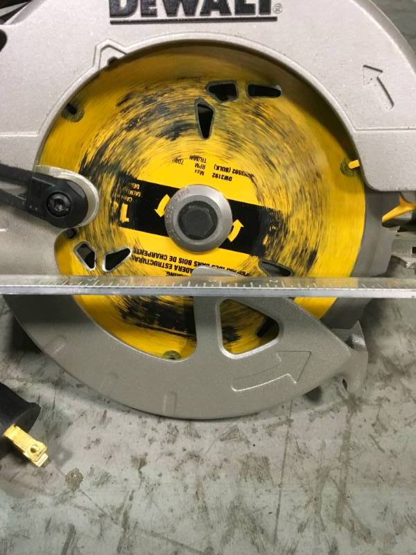 lot 84 image: DEWALT 15 Amp 7-14 in. Lightweight Circular Saw in very good condition