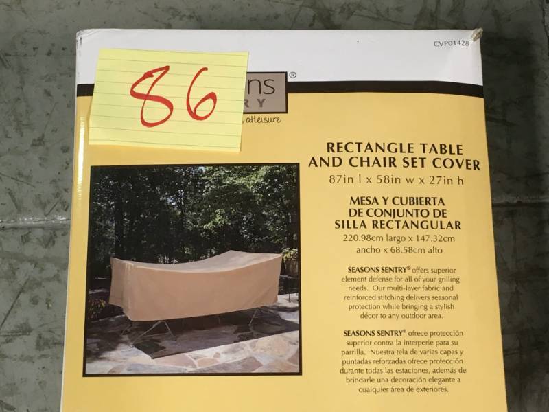 lot 86 image: Seasons Sentry Rectangle Table and Chair Set Cover  open box in like new condition