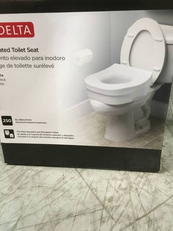 lot 93 image: Delta Elevated Toilet Seat in White  open box in like new condition