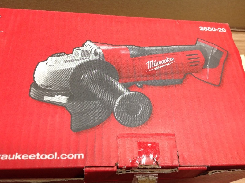 lot 107 image: Milwaukee  M18 18-Volt Lithium-Ion Cordless 4-12 in. Cut-OffGrinder (Tool-Only) not used