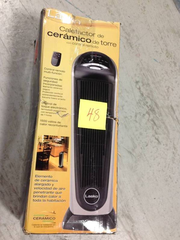 Lasko 23 in. 1500-Watt Electric Portable Ceramic Tower Heater   Open box in like new condition