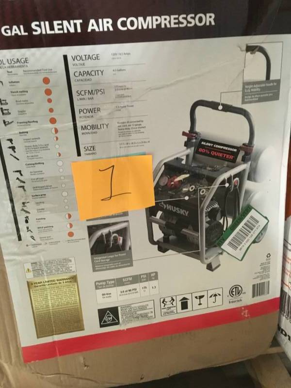 lot 1 image: Husky 4.5 Gal. Portable Electric-Powered Silent Air Compressor open box in like new condition