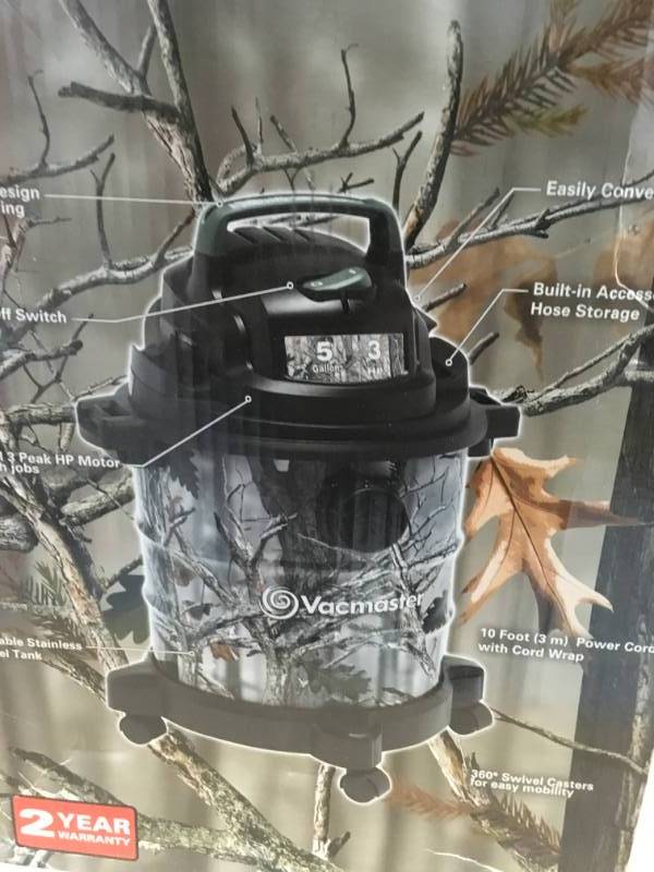 lot 35 image: Vacmaster 5 Gal. Camo Metal Tank WetDry Vacuum open box in like new condition
